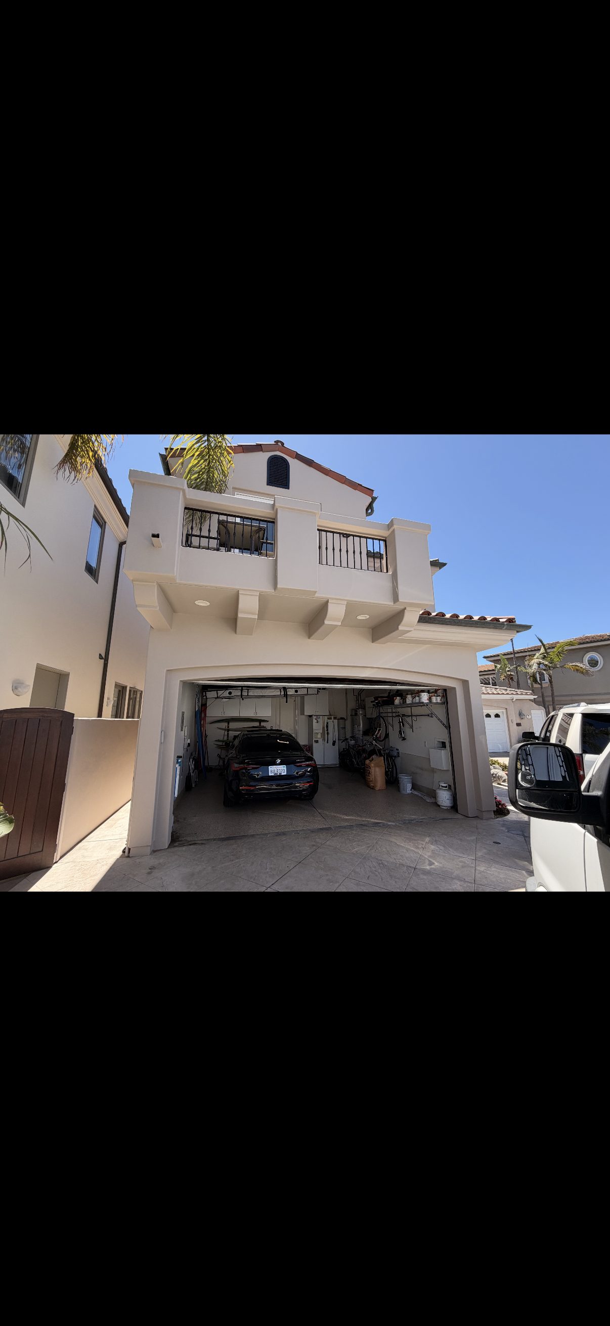 Mediterranean stucco exterior freshly painted warm beige